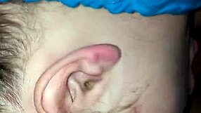 amateur interracial couple engages in blowjob with deepthroat, moaning loudly throughout the session