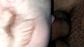 amateur interracial couple engages in blowjob with deepthroat, moaning loudly throughout the session