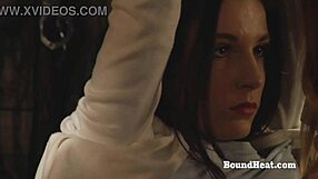 busty lesbian slave moans loud while fingered by dominant mistress