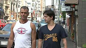 kaoruko, asian babe, handles two cocks and gets cum facial