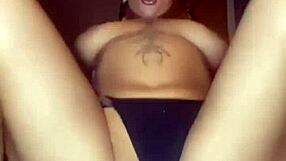 A big-boobed goth masturbates with force and achieves an orgasm