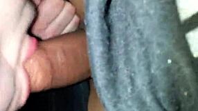 amateur interracial couple engages in blowjob with deepthroat, moaning loudly throughout the session