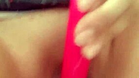 Muscular woman masturbates pussy with dildo while fantasizing about a penis.