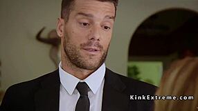 A teenage girl is tied up and has her throat and ass spanked in a BDSM scene