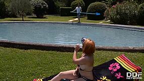 busty redhead fucks pool boy