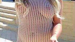 Young blonde’s transparent dress makes her almost naked outdoors