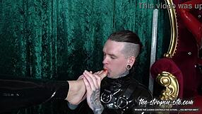 Femdom stretches slave's ass with intense anal fisting in latex bondage