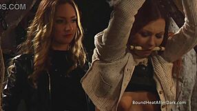 Big boobs lesbian slave whipped by dominant madame, ass punished in femdom bondage.