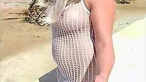 Young blonde’s transparent dress makes her almost naked outdoors