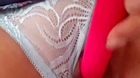 Muscular woman masturbates pussy with dildo while fantasizing about a penis.