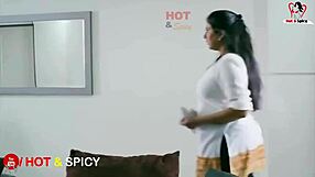 Swarnamalaya flaunts her massive big boobs in steamy display