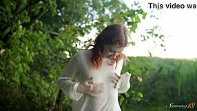 Teen redhead mia masturbates to wild orgasm by the lake