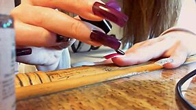 Sexy ASMR video featuring long nails and hands.