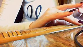 Sexy ASMR video featuring long nails and hands.