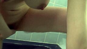 Wild Asian MILF Sofia Takigawa with huge boobs strokes herself in a steamy hot bathtub.