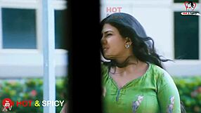 Swarnamalaya flaunts her massive big boobs in steamy display