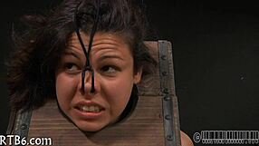 Girl strips wildly in cage!