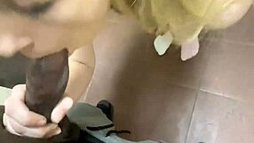 Pretty slut with blue eyes gets humiliated by big black cock in public bathroom.