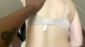 Pretty slut with blue eyes gets humiliated by big black cock in public bathroom.