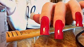Sexy ASMR video featuring long nails and hands.