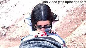 skinny girl gives deep blowjob with glasses in canyon pov