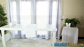 busty masseuse gives handjob at desk gloryhole