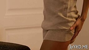 Young woman engages in intimate activity with partner in seductive manner