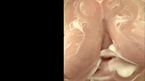 French mom caresses big tits in secret shower.