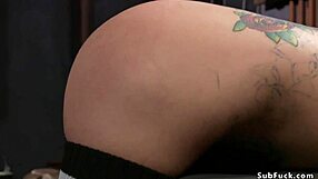 Bent over busty babe ass caned in bondage