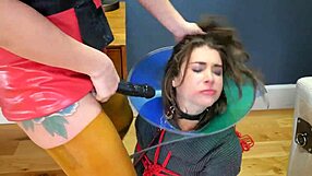 hey, check this bdsm slut gagging hard on a strapon