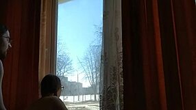 helga bosk takes risks by the window with people walking by