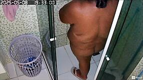 hidden camera records hot neighbor shaving her big pussy