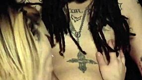 Blonde couple performs spitting blowjob and ball licking.