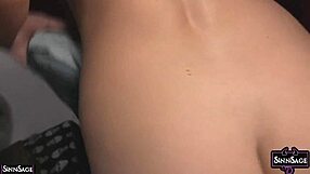 Sinn Sage strips and shows tits