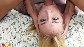 Hot blonde teen gags on massive cock during rough face fucking.