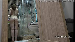 Beautiful tattooed teen Petra caught in bathroom on hidden cam.