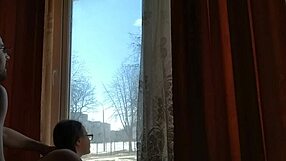 helga bosk takes risks by the window with people walking by