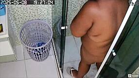 hidden camera records hot neighbor shaving her big pussy