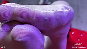 goddess with big booty teases feet in white stockings on red couch