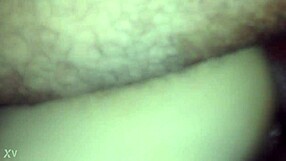 She bends over in doggystyle, using oil because it hurts, as the amateur thrusts deeply into her.