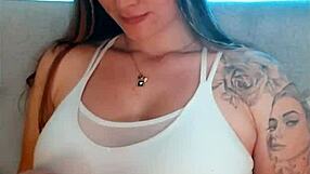 tattoed babe going crazy on webcam with fingering