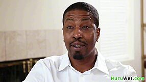 Amazing busty blonde milf masseuse teases black client with sensual nuru massage