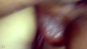 She bends over in doggystyle, using oil because it hurts, as the amateur thrusts deeply into her.