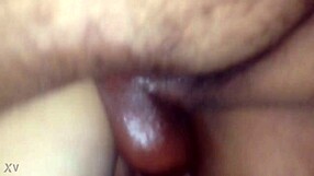 She bends over in doggystyle, using oil because it hurts, as the amateur thrusts deeply into her.