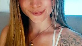 tattoed babe going crazy on webcam with fingering