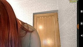 Look at this redhead playing with her dildo?