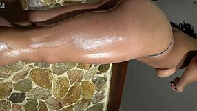 Detailed View of Xattlalust's Oiled Butt and Legs in Red and Dark Blue Panties