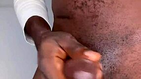 Ninja man strokes his monster cock and cums hard on himself.