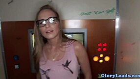 Spex Beauty Sucks Cock Through Gloryhole Close-Up