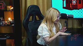 Blonde on podcast table with small panties